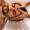 A man getting a soothing head and shoulder massage at a tranquil spa.
